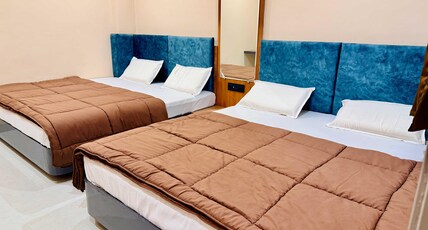Ganpati Palace Room Type - Four Bed AC Room