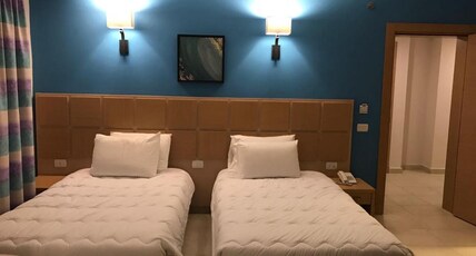Hotel Adhi Room Type - Super Deluxe Room