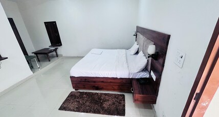 Hotel Pushpita Sweets & Bakers Room Type - Standard Room with Hill View King Bed Hotel Pushpita Sweets & Bakers Room Type - Standard Room with Hill View King Bed