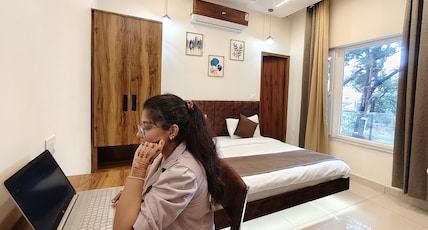 Hotel Ramayan Inn (Behind Pramarth Niketan) Room Type - Premium Room - Balcony View Hotel Ramayan Inn (Behind Pramarth Niketan) Room Type - Premium Room - Balcony View