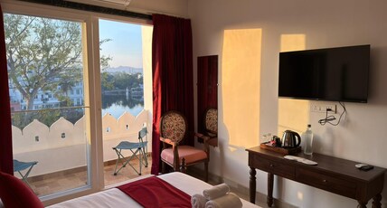 THE SARAI Room Type - Premium lake view room with a balcony