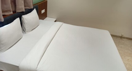 Hotel Suvarnam Residency Room Type - DELUXE ROOM