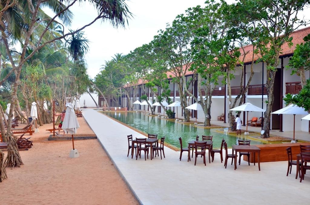 Pandanus Beach Resort & Spa - Tap to explore photos