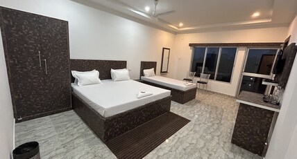 Sneha Bhawan Kaziranga Room Type - Executive Triple Room (AC & Private Balcony)