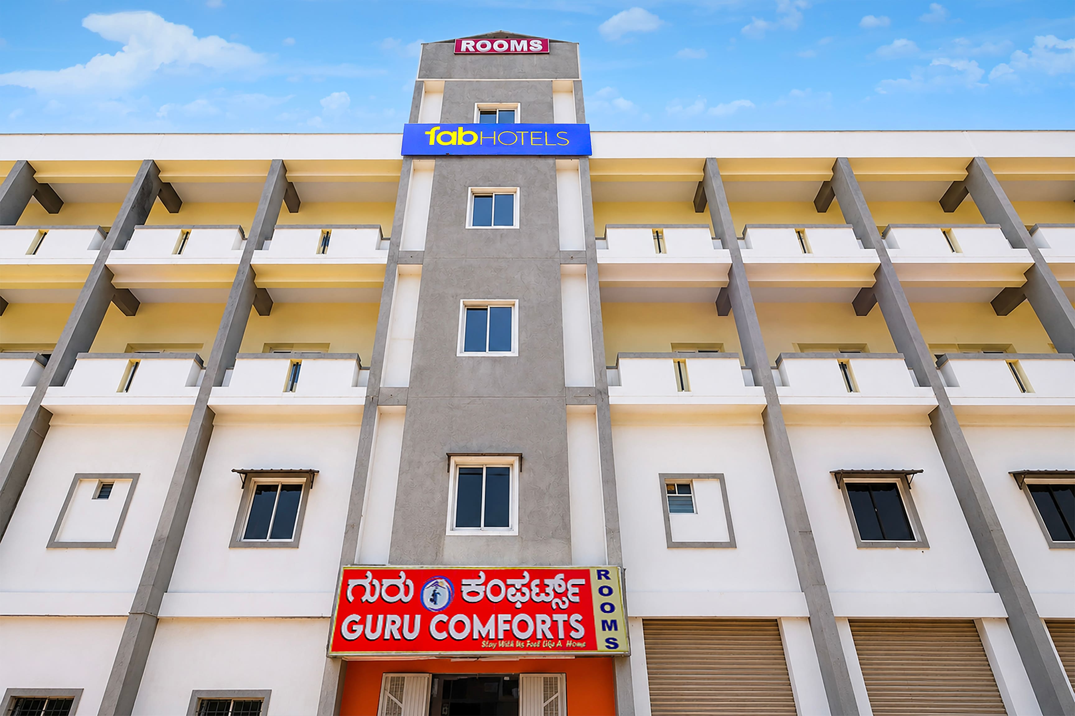 FabHotel Guru Comforts - Tap to explore photos