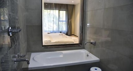 Hotel Hrushikesh. Room Type - Deluxe Double Bed With Bath Tub. Hotel Hrushikesh. Room Type - Deluxe Double Bed With Bath Tub.