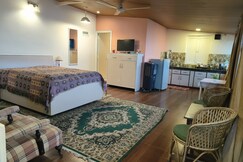 Studio room facing the Dehradun Valley
