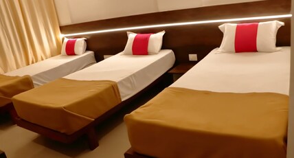 Hotel kulswamini  Room Type - Triple Bedroom Non AC