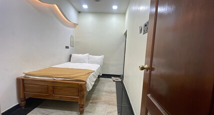SUNRISE LUXURY ROOM STAY Room Type - Deluxe Double Compact Room