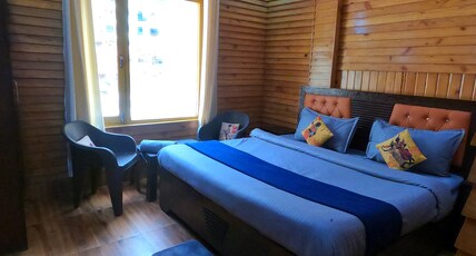 Bagwan home Stay Room Type - premium room