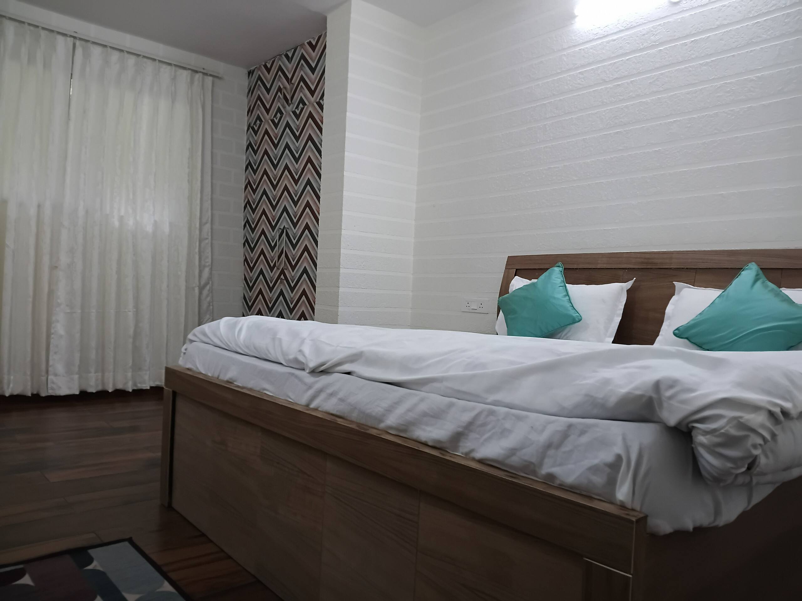 The Green Feather 2BHK Apartment with a kitchen - Tap to explore photos