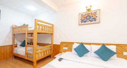 Snow Peak Retreat & Cottages (Centrally Heated- Hill View) Room Type - Family Room (Triple bedded) Air Conditioned-Centrally Heated Snow Peak Retreat & Cottages (Centrally Heated- Hill View) Room Type - Family Room (Triple bedded) Air Conditioned-Centrally Heated