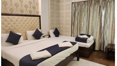 Saibaba International Supreme Vegan Hotel Room Type - TRIPLE BED AC ROOM (With Saibaba Temple Pickup And Drop) Saibaba International Supreme Vegan Hotel Room Type - TRIPLE BED AC ROOM (With Saibaba Temple Pickup And Drop)