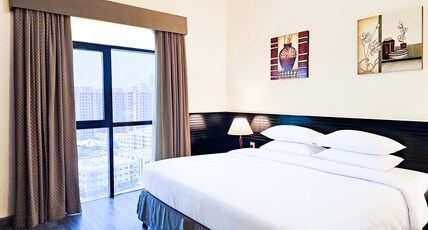 Ramada Hotel & Suites by Wyndham Ajman Room Type - 1 King Bed Suite