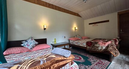 Travellers Homestay Room Type - 4 bedded standard