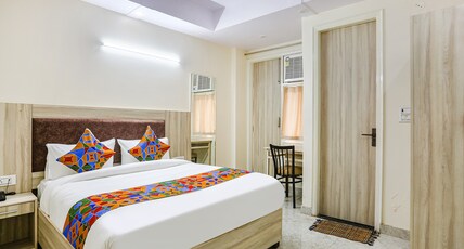 FabHotel Taugan Inn - Nr. Yashobhoomi Convention Centre Room Type - Deluxe Room