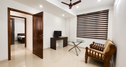 Stayzone Haritham | Near Padmanabhaswamy Temple Room Type - 2 Bedrooms in a Shared Apartment AC