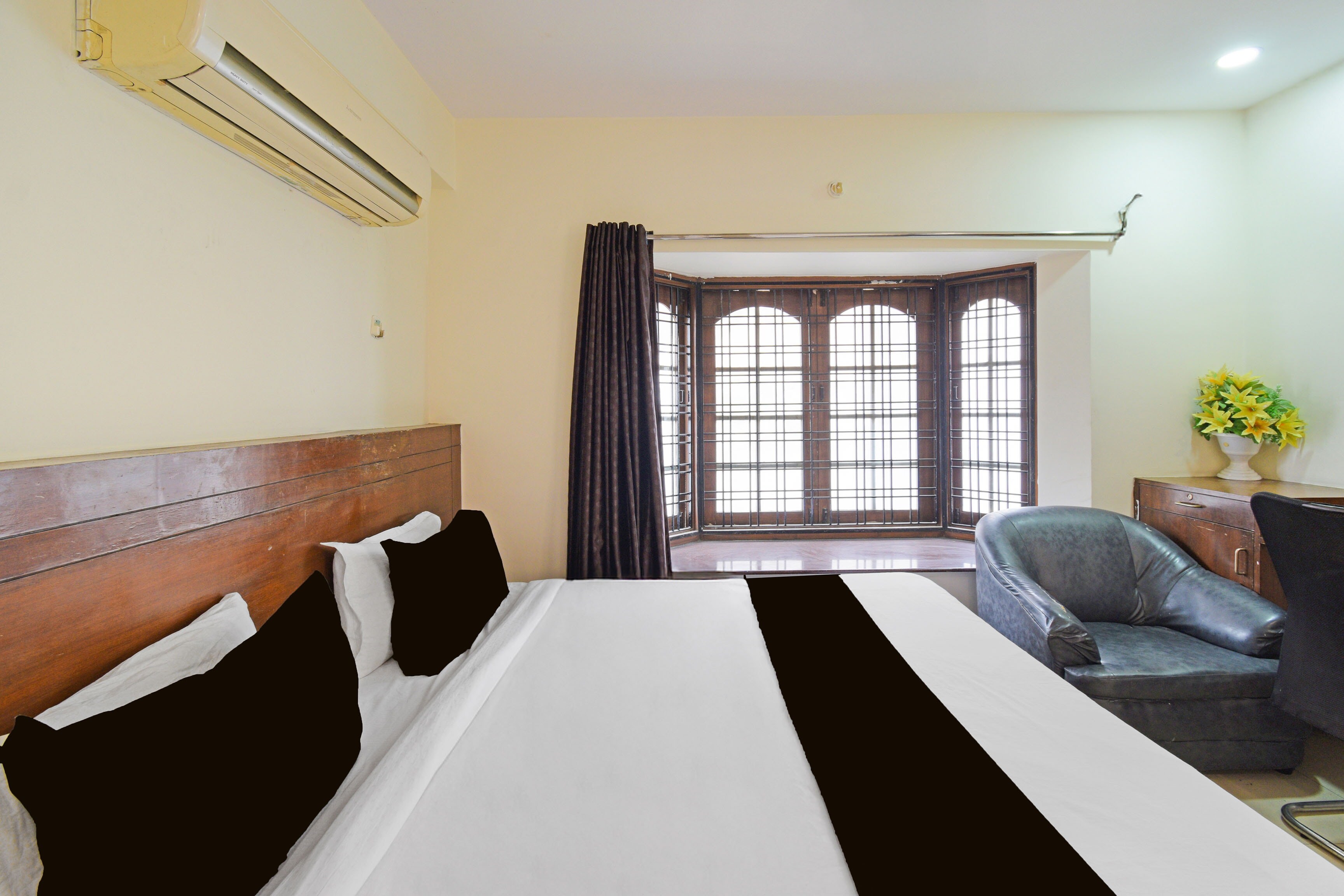 Hotel O VSM Suites - Tap to explore photos