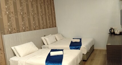 Collection O Near Tanjung Batu Formerly 4orty Inn Room Type - Standard Triple