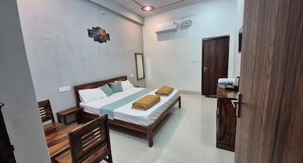 Hotel Om Sai Room Type - Queen Bed AC Room