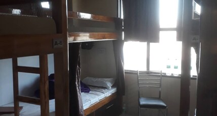 Hotel Madani Room Type - Mixed Dormitory  1 single Bed  with Shared Attached Bathroom