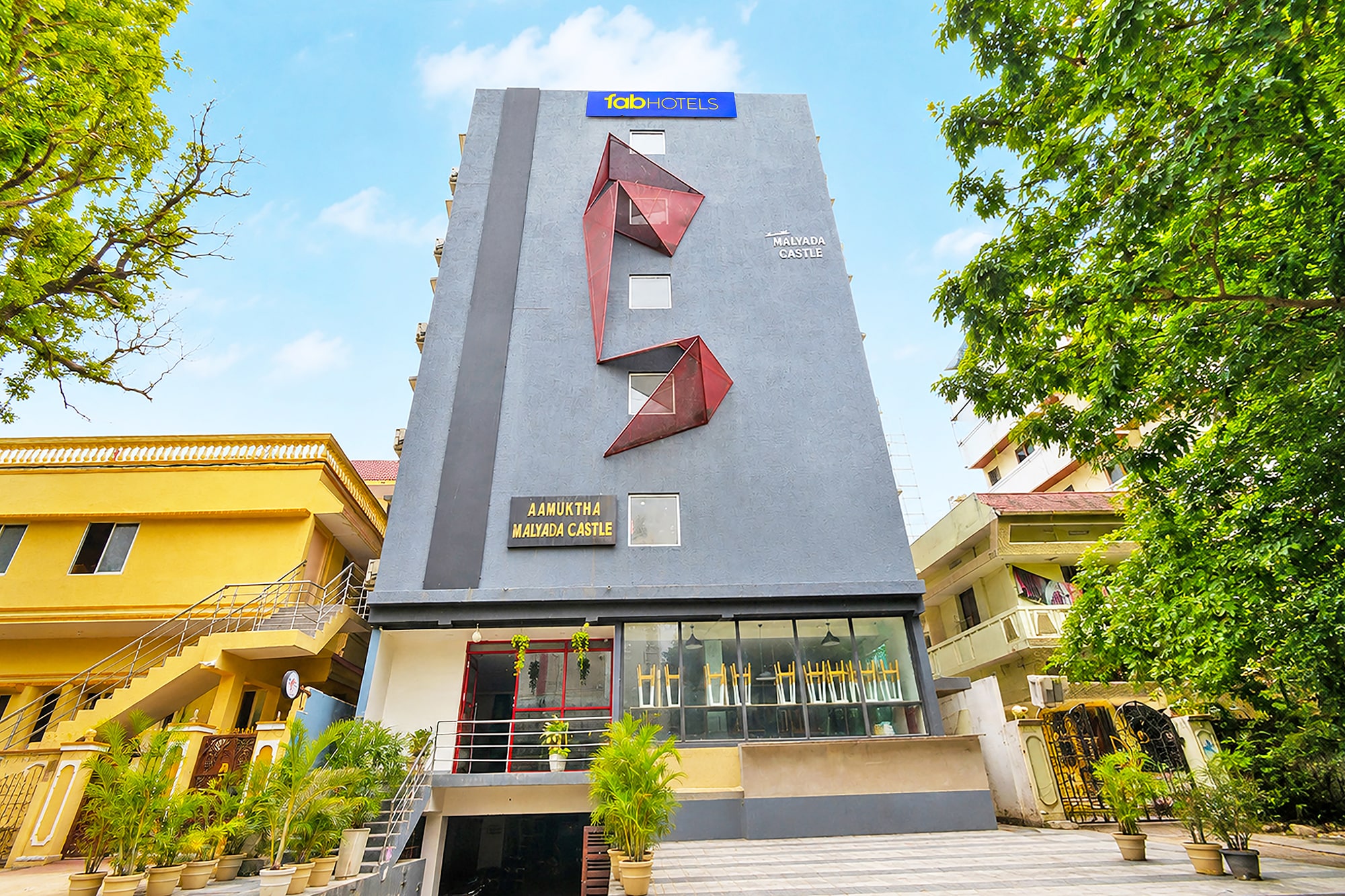 FabHotel AM Castle - Nr ESI Hospital Metro Station - Tap to explore photos