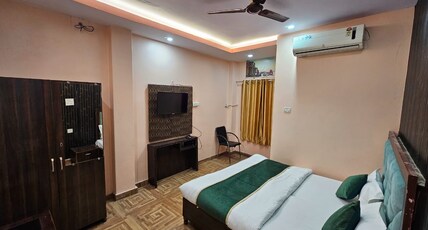 Assi River Guest House Room Type - AC Deluxe Room