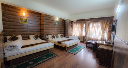 Hotel Marvel International Room Type - Super Deluxe Four Bedded Room (Road View)