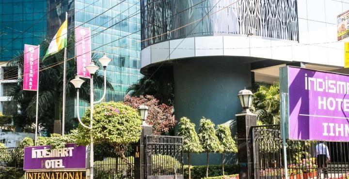 IndiSmart Hotel - Tap to explore photos