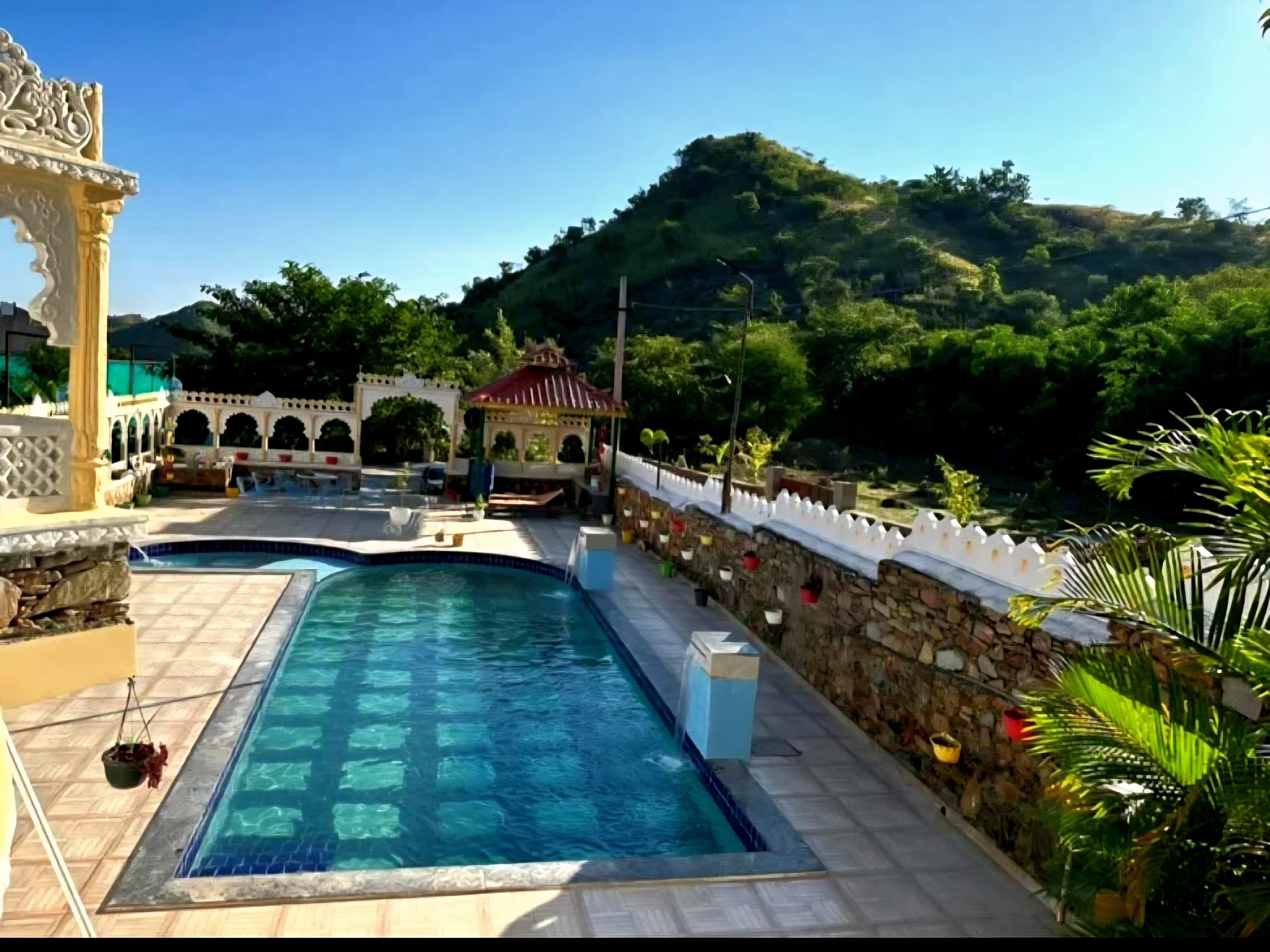 Royal Portico Villa & Resort - Tap to explore photos