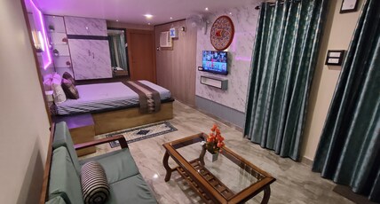 Nirmal LODGE, Raha Room Type - Bedroom 7 - Super Deluxe Room
