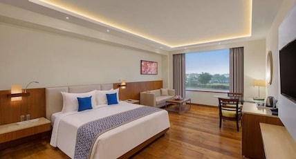 Viraj Sarovar Portico Room Type - Junior Suite - 1 Double Bed 49SQM WiFi Living Area Bathtub and Shower Viraj Sarovar Portico Room Type - Junior Suite - 1 Double Bed 49SQM WiFi Living Area Bathtub and Shower