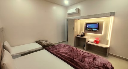 Hotel RN Residency Vrindavan Room Type - Executive Room with One Double Bed and One Single Bed Hotel RN Residency Vrindavan Room Type - Executive Room with One Double Bed and One Single Bed