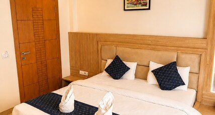 Nirmala Inn | Near Jain Ghat | Shivala Room Type - Deluxe Room