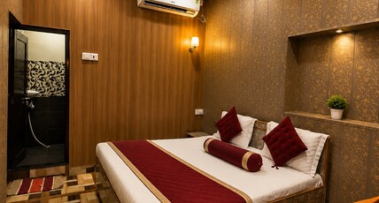 AMBRICANA PG HOUSE Room Type - Deluxe Room