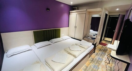 HOTEL MADNI ROYALE (50 Mtrs from Dargaah) Room Type - Super Deluxe Four Bed Room