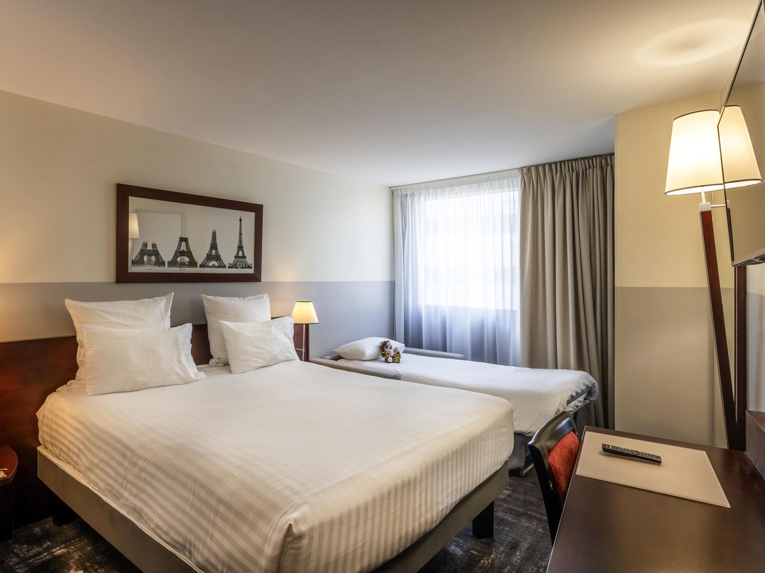 HOTEL PARIS GARE MONTPARNASSE TGV - Tap to explore photos