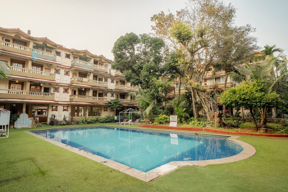 Staymaster Zuno 2BR in Candolim Pool - Tap to explore photos