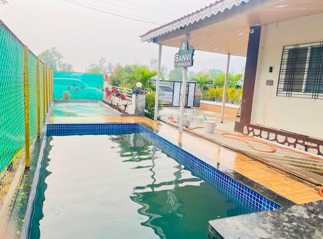 Sanvi farmhouse - Tap to explore photos