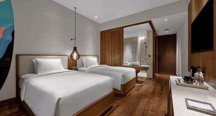 Holiday Inn Resort BALI CANGGU Room Type - 2 Twin Premium Top Floor Balcony Holiday Inn Resort BALI CANGGU Room Type - 2 Twin Premium Top Floor Balcony