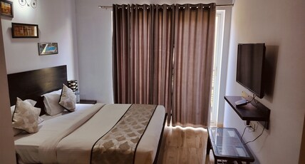 Vrindavan Holidays Home Room Type - Deluxe Room