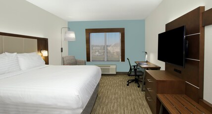 Holiday Inn Express & Suites COLUMBUS NORTH Room Type - 1 King Standard Communication Mobility Accessible Tub Holiday Inn Express & Suites COLUMBUS NORTH Room Type - 1 King Standard Communication Mobility Accessible Tub