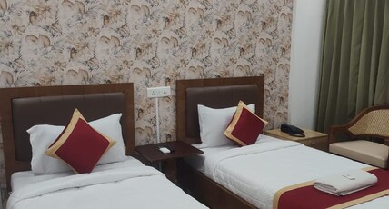 Sri Sai Comforts Manyata Tech Park Room Type - Deluxe Twin Room with Balcony