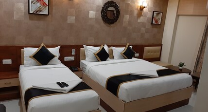 Liza Regency Near Chennai Central Railway Station Opp to Jawaharlal Nehru Stadium Room Type - Deluxe Triple Room with Balcony