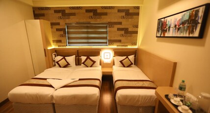 NESTLAY ROOMS VANAGARAM Room Type - Triple Deluxe with Kitchen (1BK)