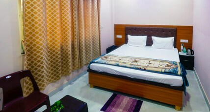Hotel Saraswati Stay Dham Room Type - Family Room with City View King Bed