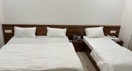 Shri Raghuvansh | 7 mins walk from Khatu Shyam Mandir Room Type - Super deluxe (1Double Bed +1 Single Bed)