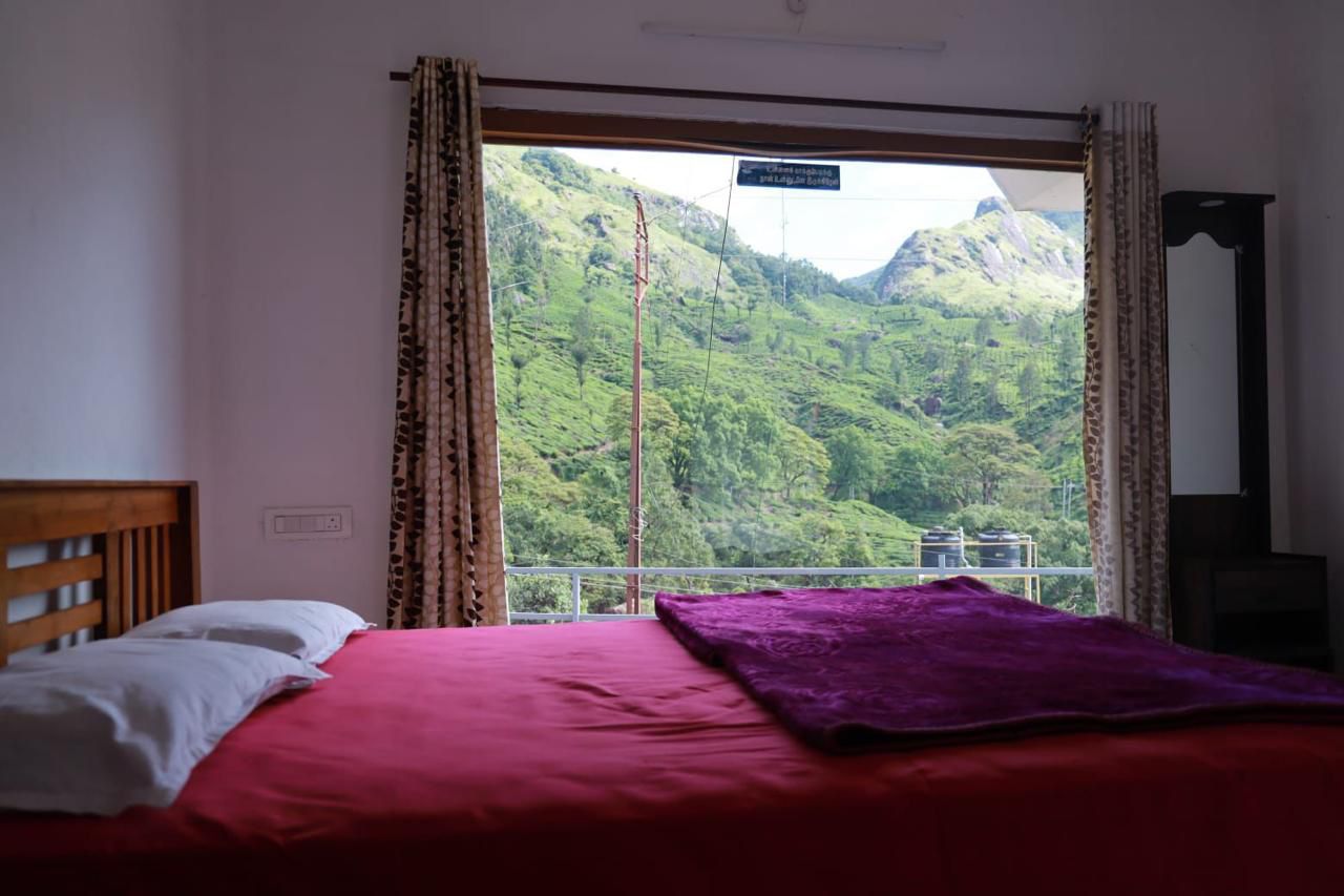 Munnar Mountain view cottage - Tap to explore photos