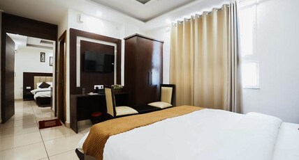 Hotel The 7 Seas AIIMS Rishikesh Room Type - Double-Bedded Family Room with balcony & Mountain View Hotel The 7 Seas AIIMS Rishikesh Room Type - Double-Bedded Family Room with balcony & Mountain View