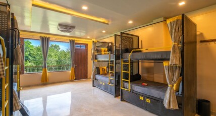 The Hosteller Bam Bir Room Type - Bed in 10 Bed Mixed Dormitory with Balcony and Hill View